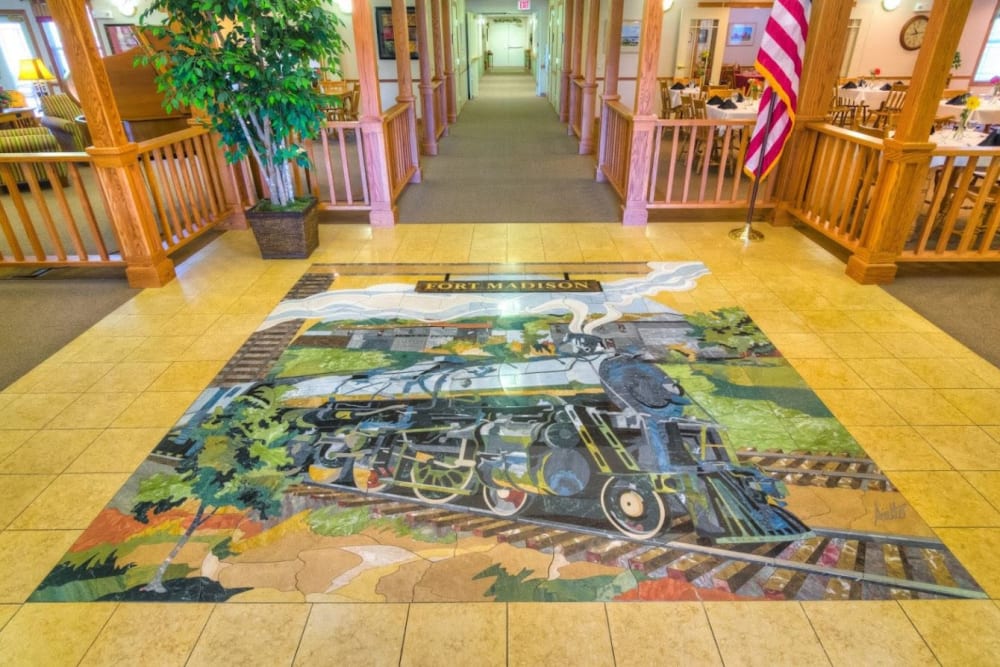 Closeup of the lobby's tile mosaic at Addington Place of Fort Madison in Fort Madison, Iowa