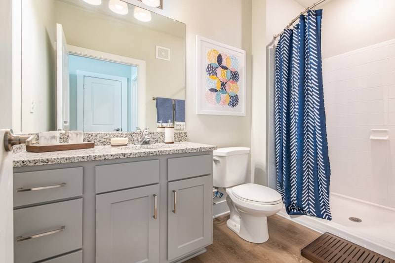 Roomy bathroom with lots of storage space under the large vanity at The Mason in Ladson, South Carolina