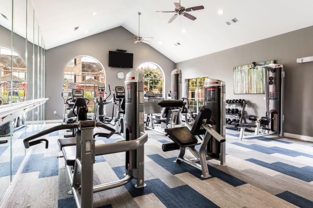 Weight machines in fitness room at Marquis on Park Row in Houston, Texas