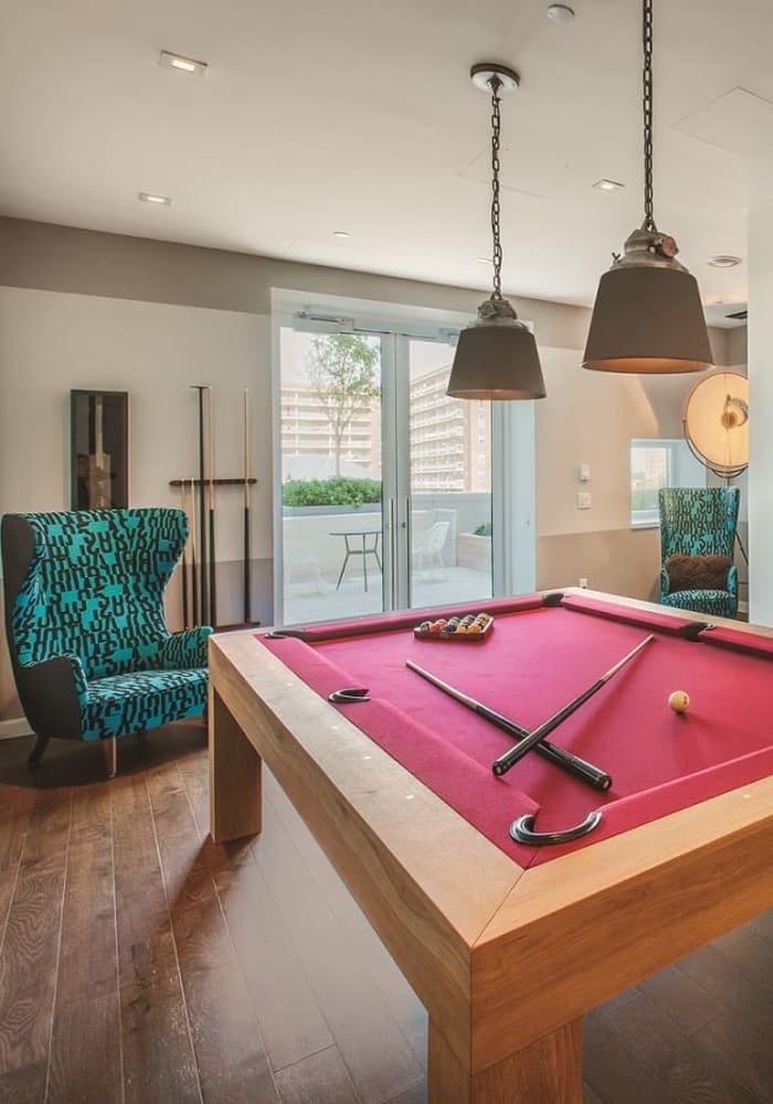 Resident pool table in the common area at The Alexander in Rego Park, New York