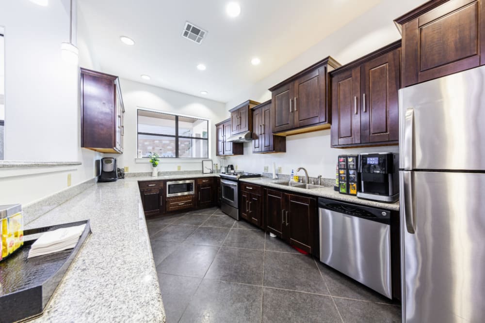 Community kitchen at Marquis at Katy in Katy, Texas