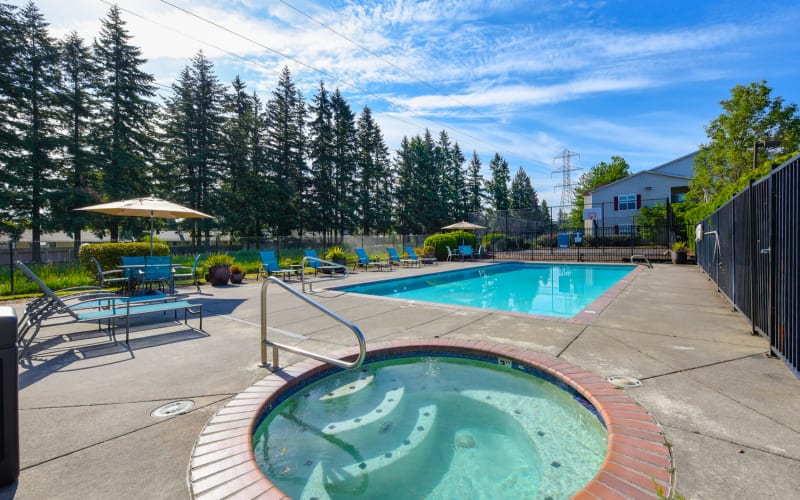 Enjoy swimming in the community swimming pool at The Landings at Morrison Apartments in Gresham, Oregon