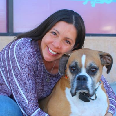 Renee hospital manger at ABQ Petcare Hospital and her dog.