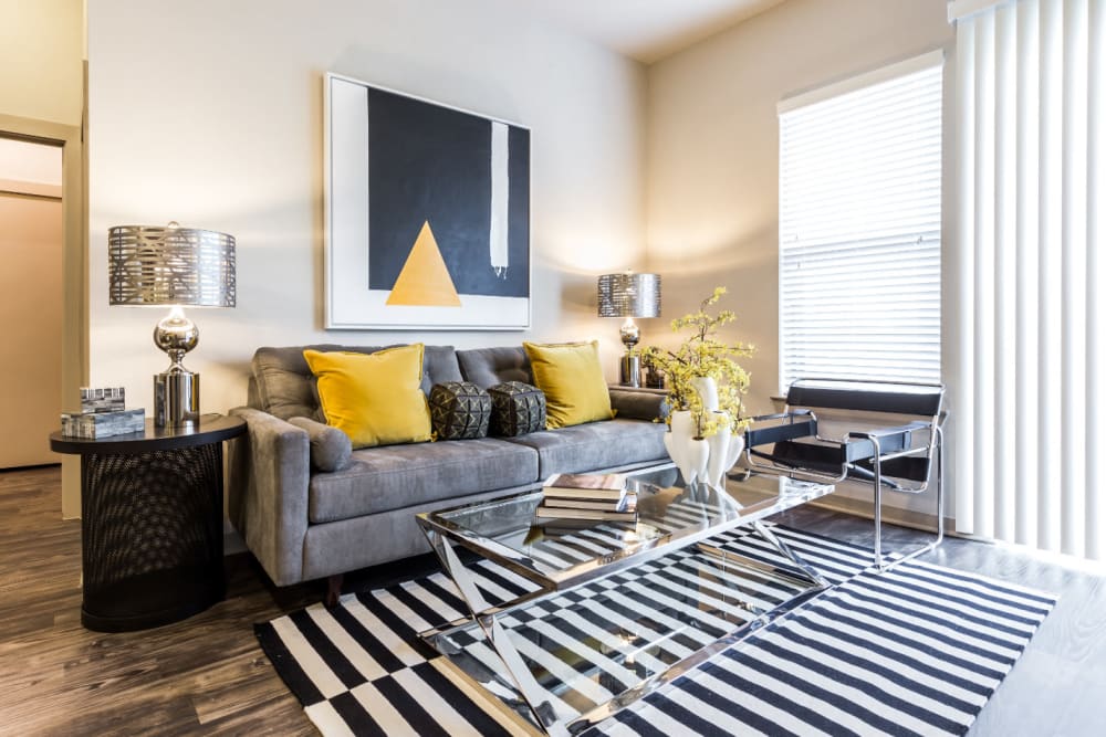 Bright and modern style living room with colorful décor at Marq Uptown in Austin, Texas