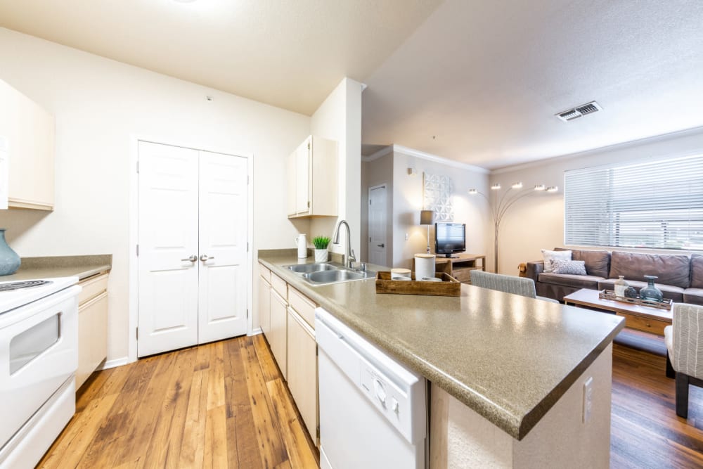 Spacious kitchen with granite counters at The Fairmont at Willow Creek in Folsom, California