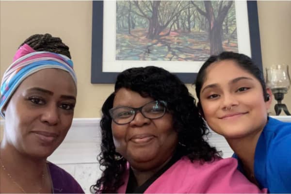 Friendly staff huddling for a photo at Carolina Gardens at Kathwood in Columbia, South Carolina
