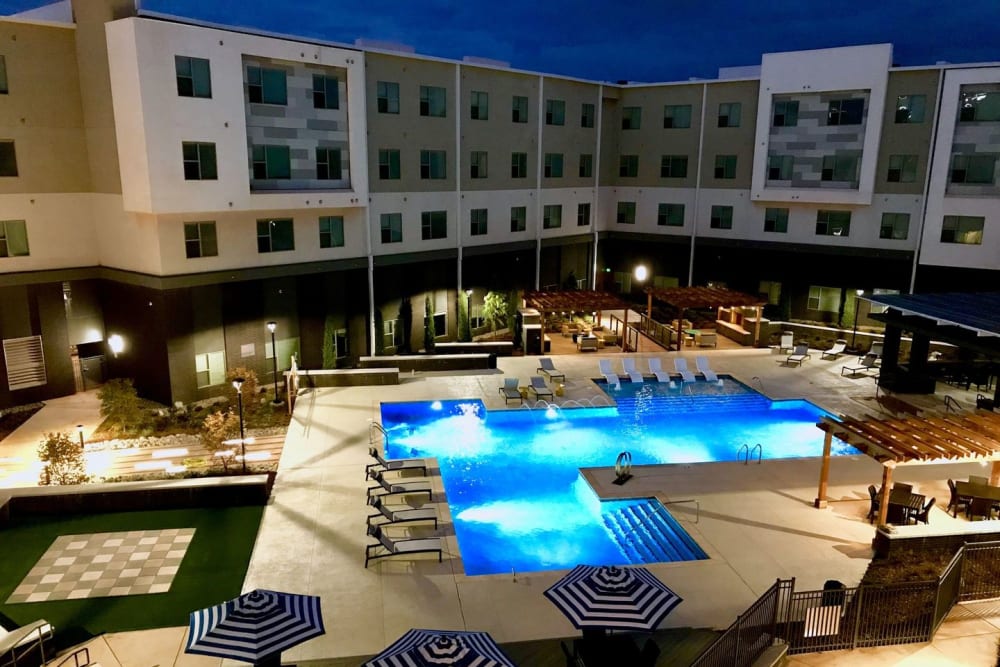Pool area and courtyard at night at Argon in Oklahoma City, Oklahoma