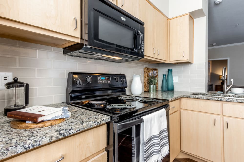 Large kitchen with plenty of cabinet space at The Links at Plum Creek in Castle Rock, Colorado