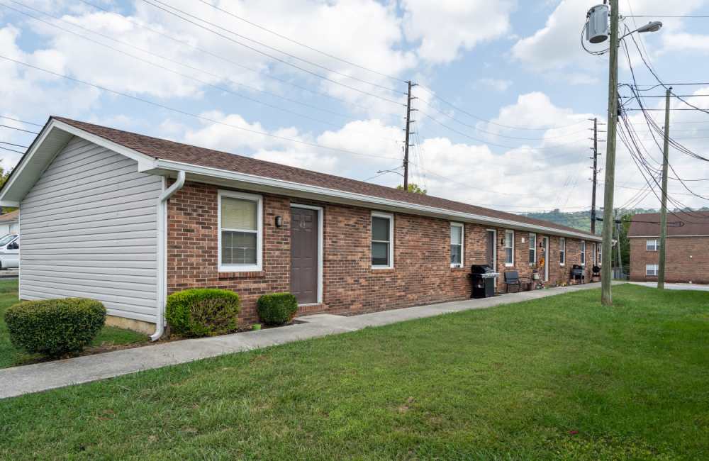 Budling with walking path at Spring Hill Apartments in Ringgold. GA
