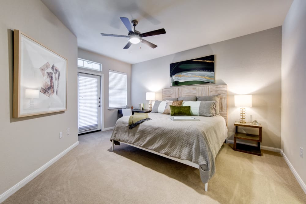 Spacious bedroom with private balcony at Marquis at Cinco Ranch in Katy, Texas