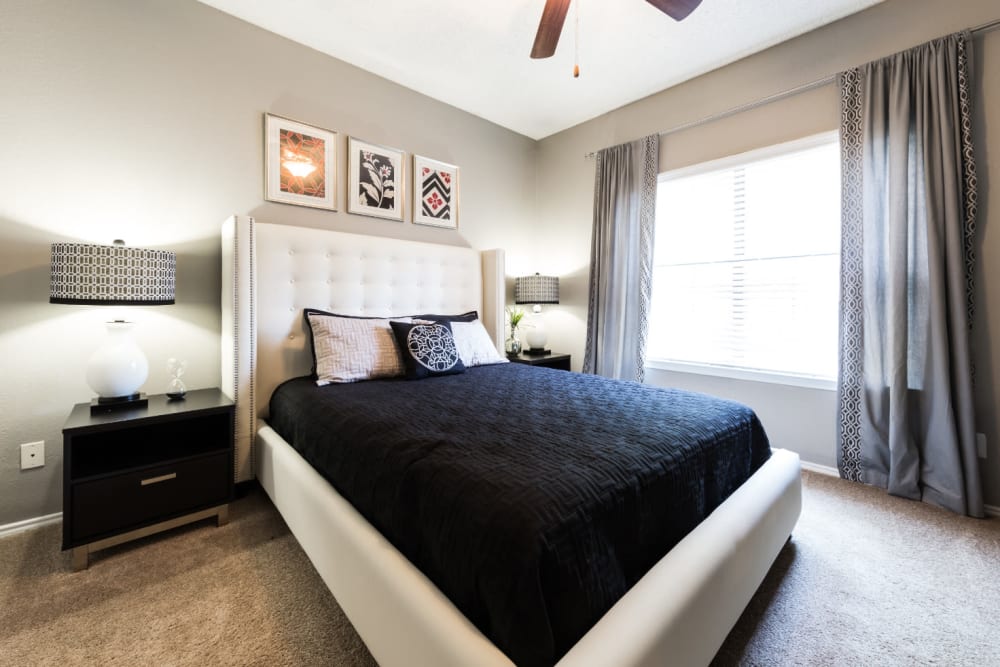 Cozy bedroom at Marquis at Legacy in Plano, Texas