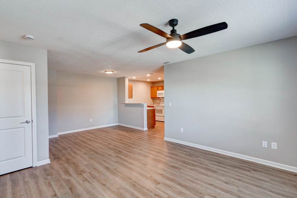 Spacious apartment with ceiling fan and open kitchen at Stanley Terrace in Plainfield, Indiana