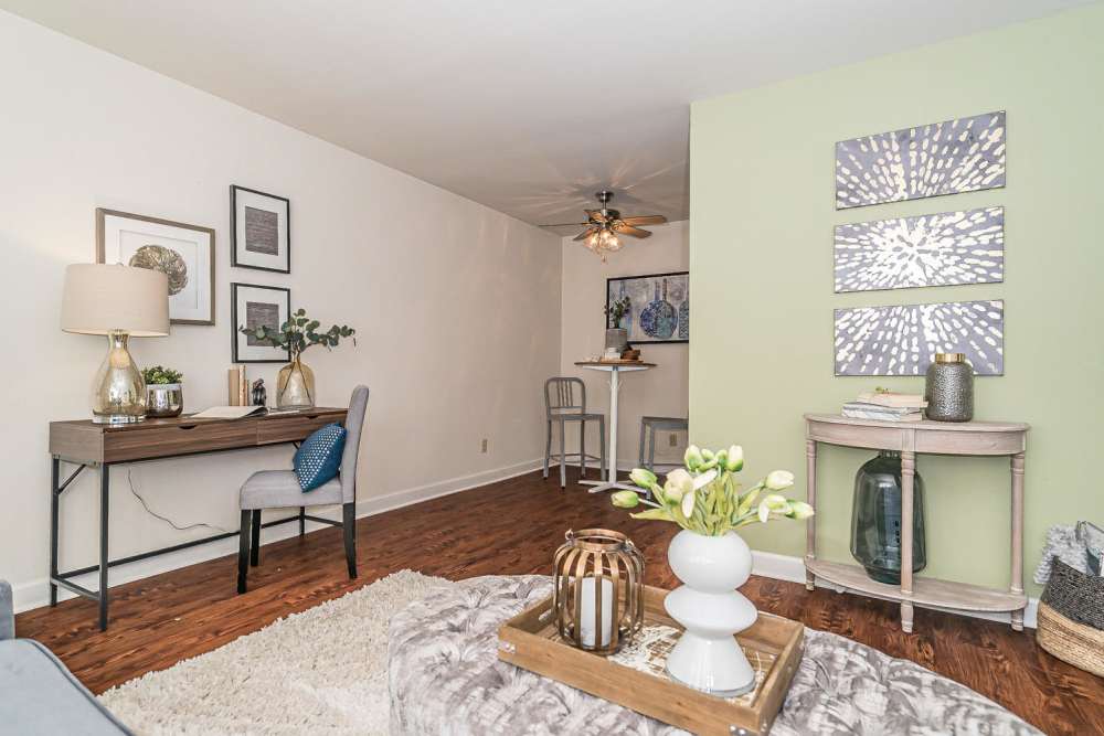 Living room with working space at Pear Tree in Saint Ann. MO