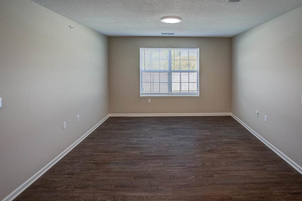 Unfurnished bedroom with window at McKay Manor in Breese. IL