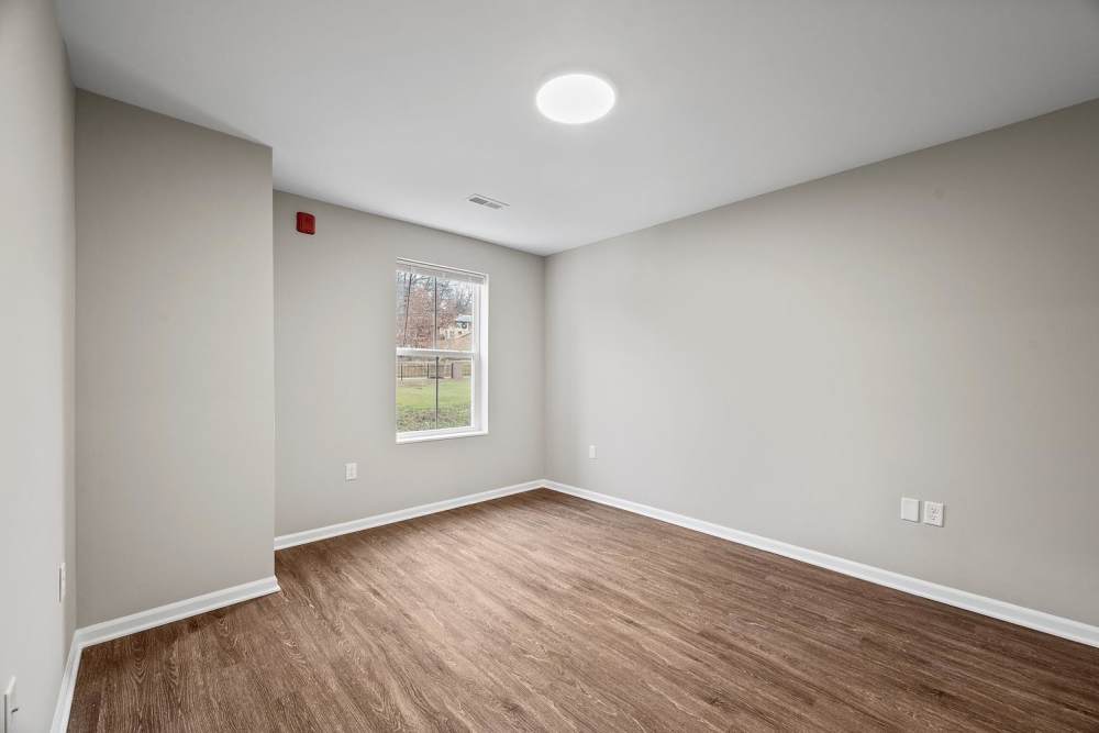 Bedroom with window at Boundary Lofts in Cranberry Township, Pennsylvania