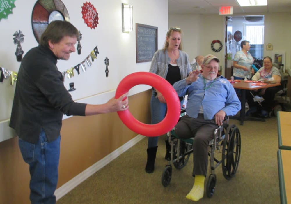 Resident and staff celebrating at Edgerton Care Center in Edgerton, Wisconsin