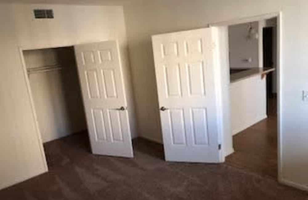 Carpeted bedroom at Oceana Apartments in Huntington Beach, California