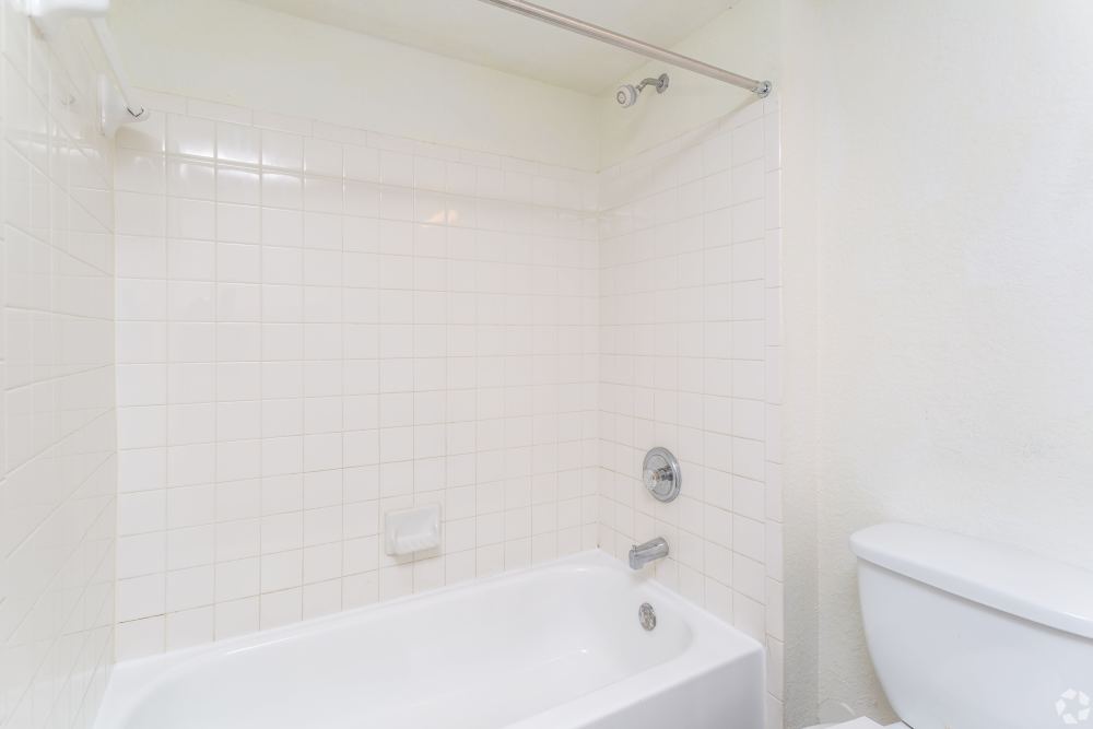 Bathroom with bathtub at Sunset Bay Apartments in Cutler Bay, Florida