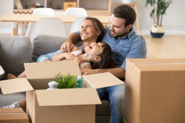 A family packing boxes at Store It All Self Storage - Westlake in Austin, Texas