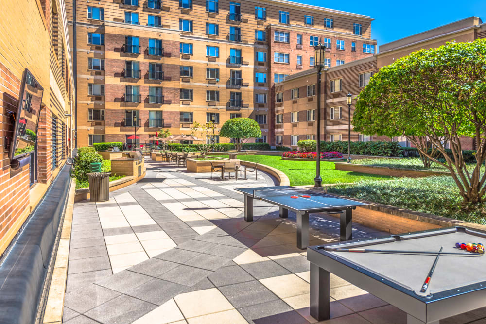 Incredible patio with seating and a gorgeous view of the courtyard at 55 Riverwalk Place in West New York, New Jersey