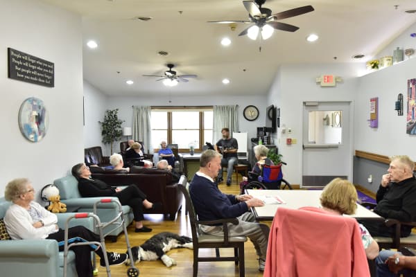 A group of residents in an activity room at Reflections at Garden Place in Columbia, Illinois.
