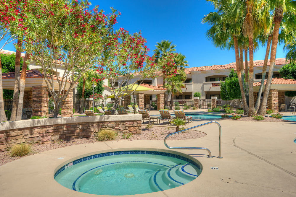 Luxurious hot tub near the pool at San Prado in Glendale, Arizona