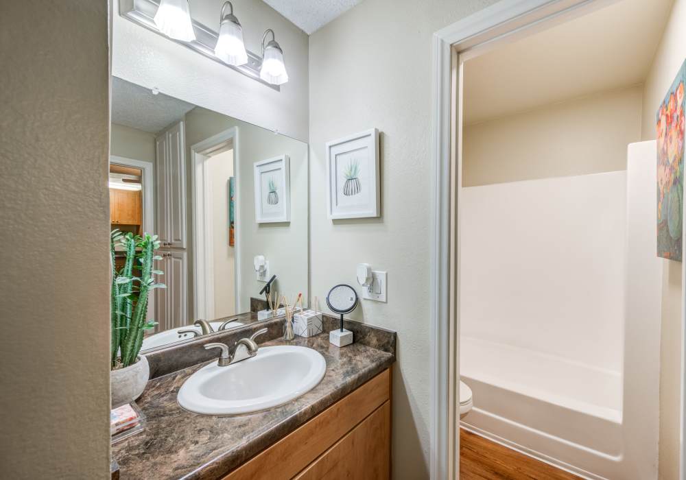 Bright washroom at UCE Apartment Homes in Fullerton, California, 