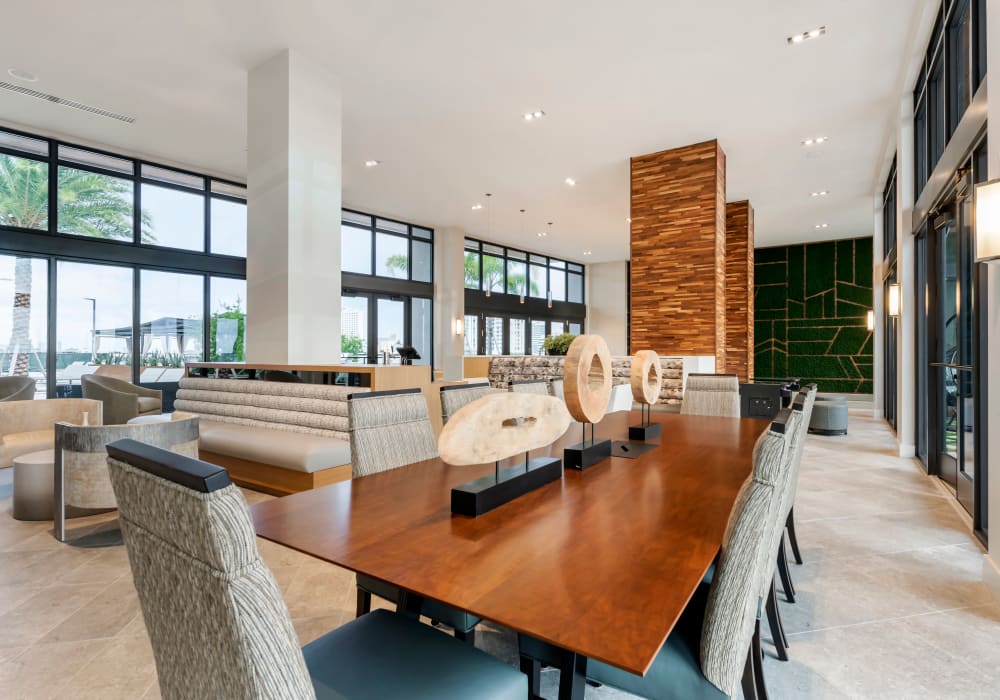 Luxury clubhouse with large meeting table at Motif in Fort Lauderdale, Florida