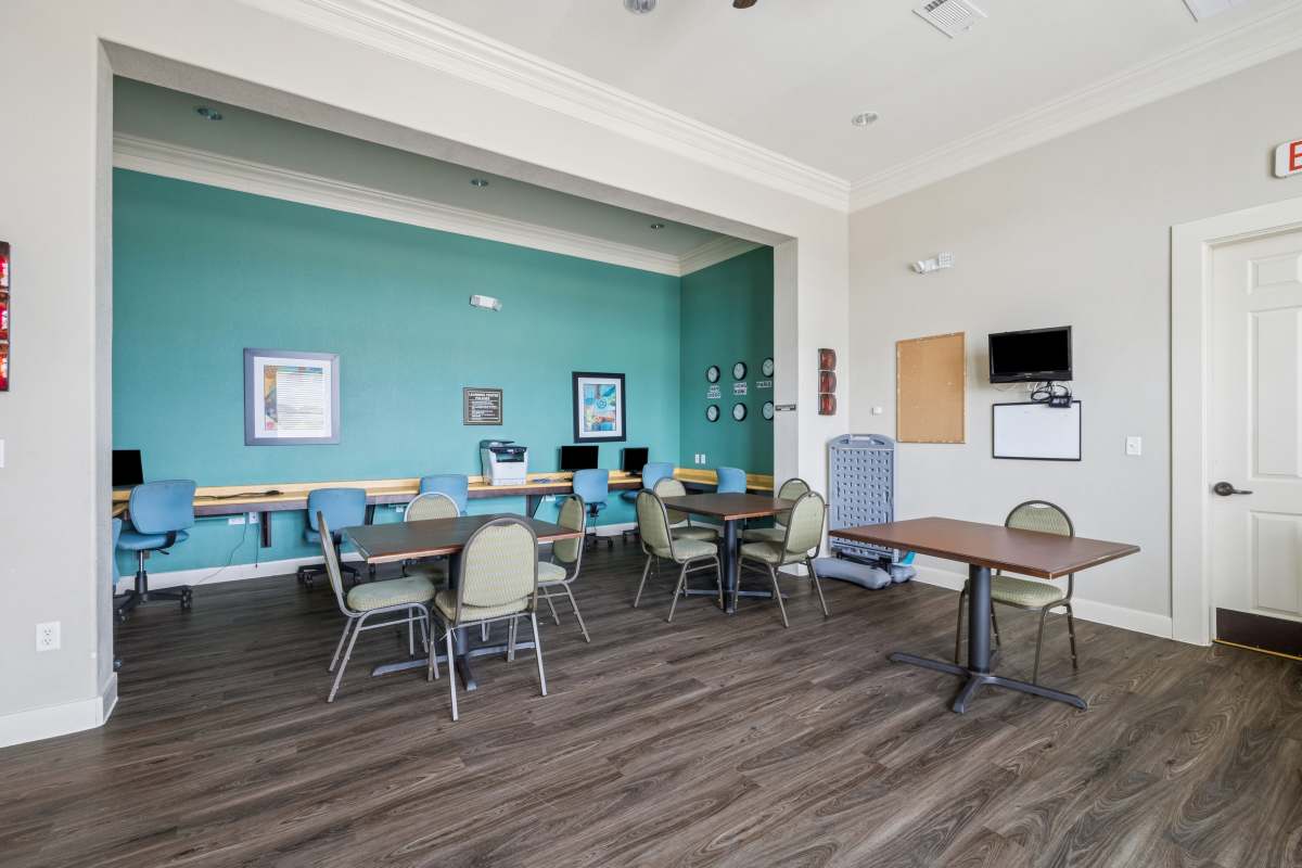 Apartment business center with computers at The Cove at Palmer Point in Texas City, Texas
