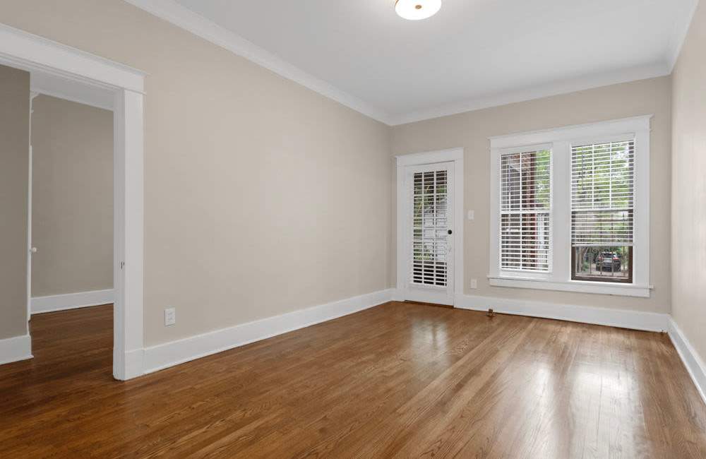 Unfurnished area with french door and window , hard wood flooring at Belvedere Place in Memphis, Tennessee