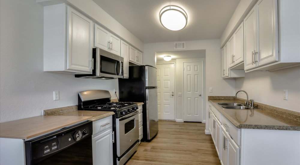 Kitchen with quartz countertop at San Jose Greens in San Jose, California