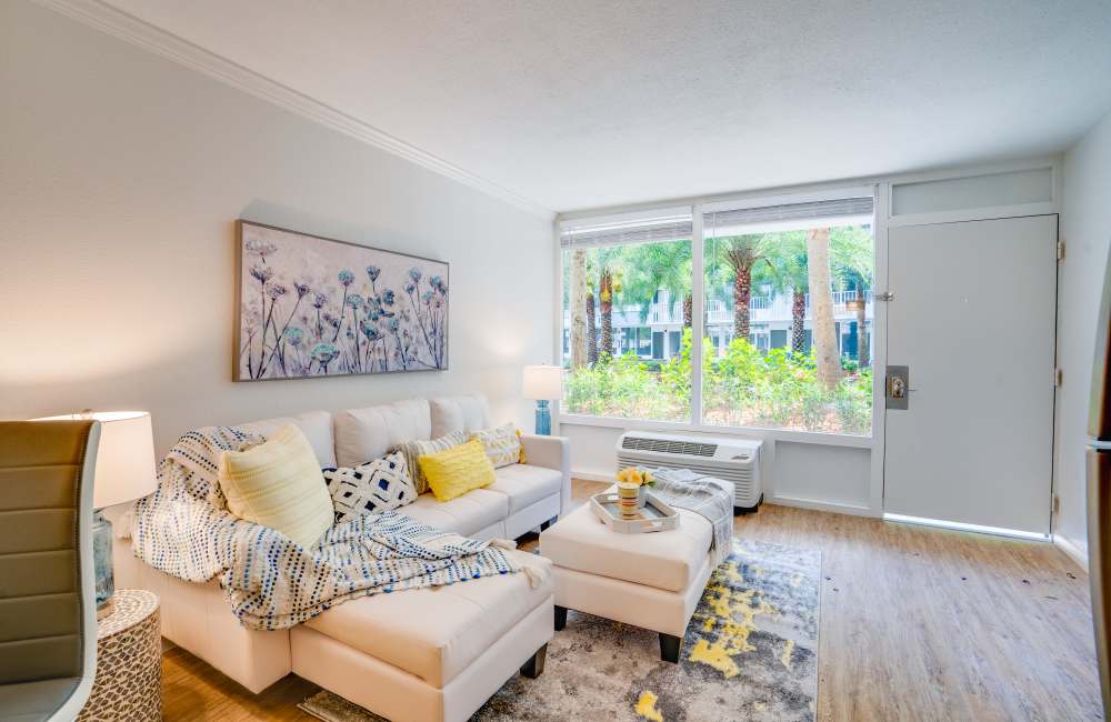 Well-furnisehd modern living area at West Bay Village in Kissimmee, Florida