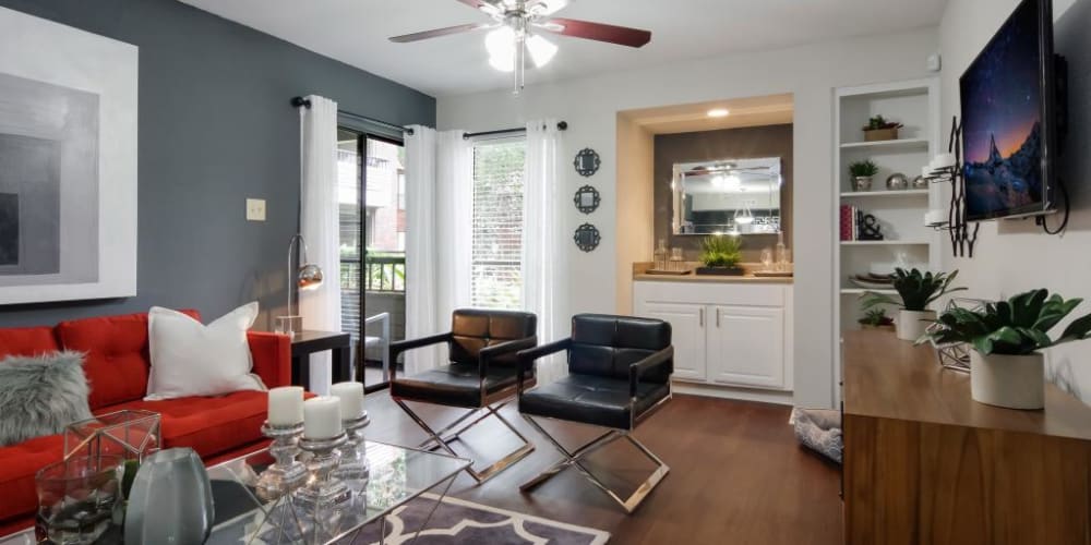 Cozy living room with porch access at Circle at Point Park in Houston, Texas