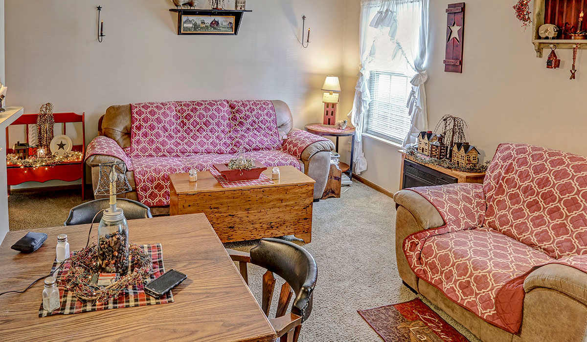 Bright living room at Glennview Apartments in Washington Court House, Ohio