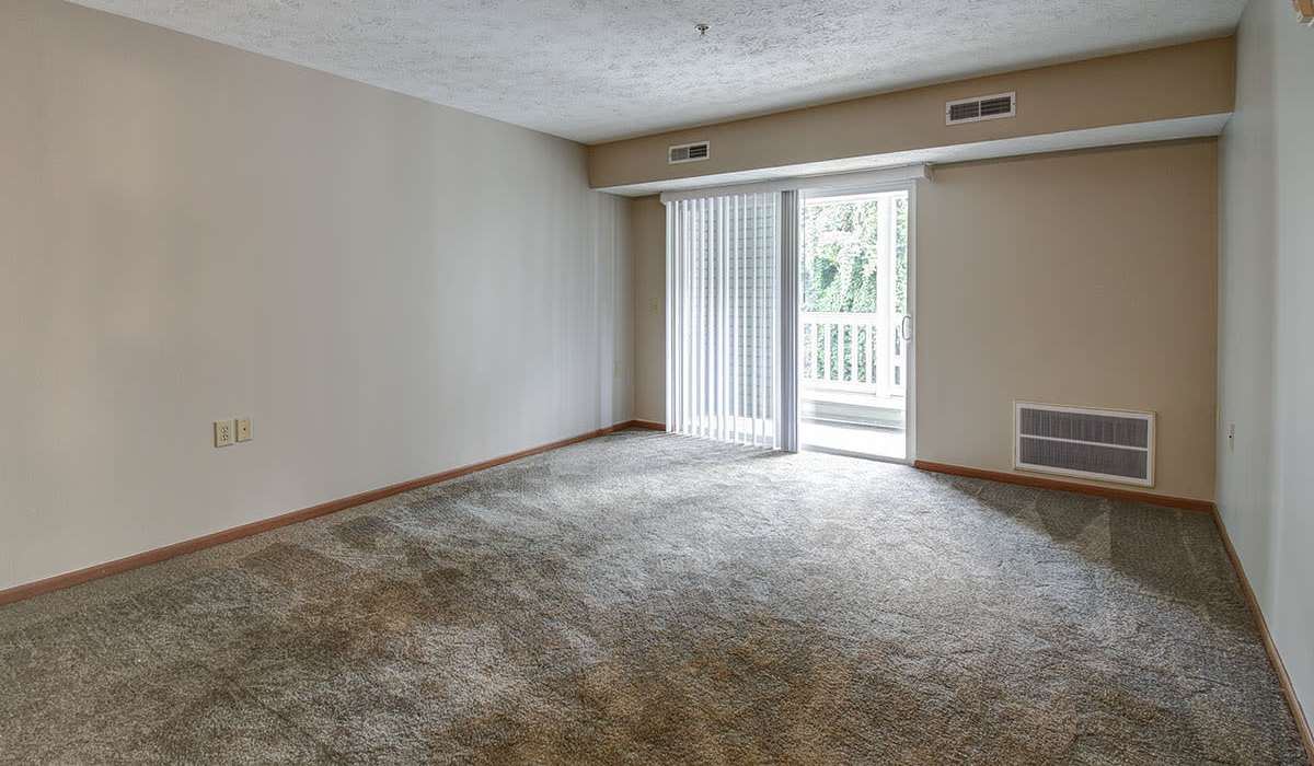 Living area with air conditioning at Providence Greene II in Wheeling, West Virginia