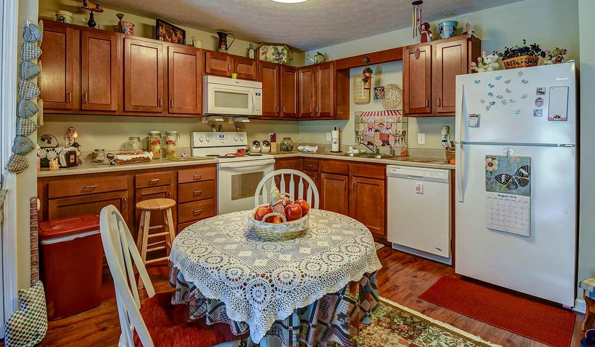 Spacious kitchen with dishwasher at Capital Greene in Wheeling, West Virginia