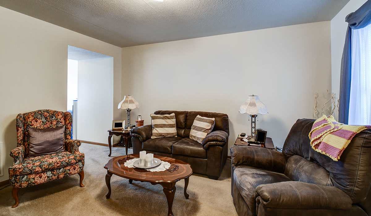 Living room of apartment at Muirwood Greene in Romney, West Virginia