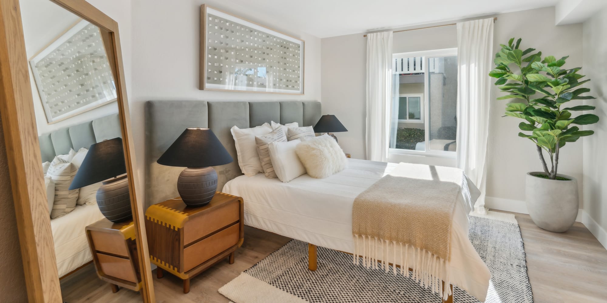 Large bedroom in a model apartment home at Haven Poway in Poway, California