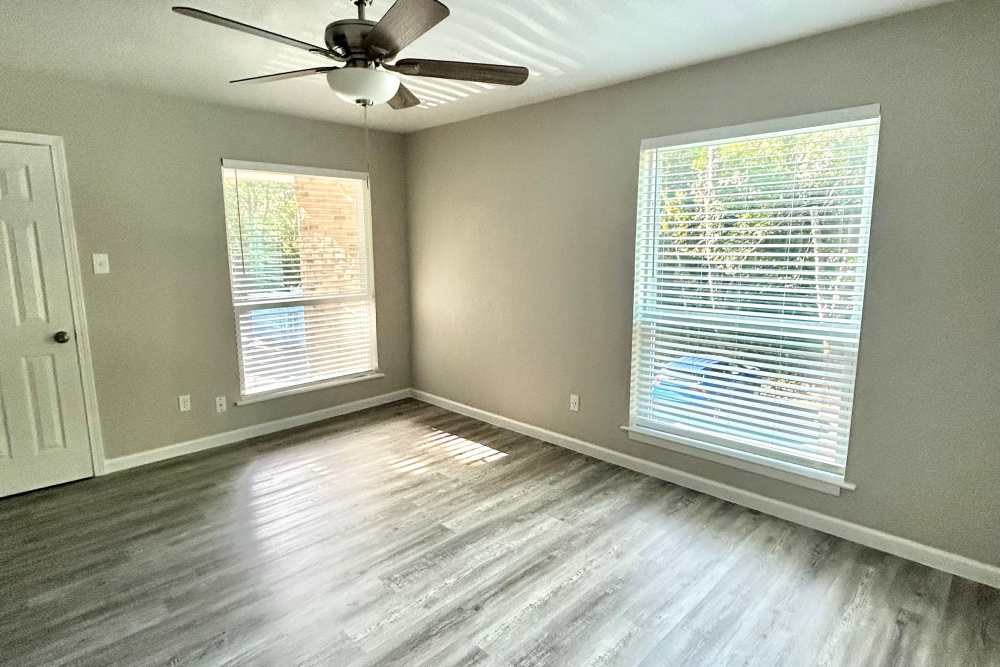 Spacious living room at Athena Garden Apartments in Athens, Texas