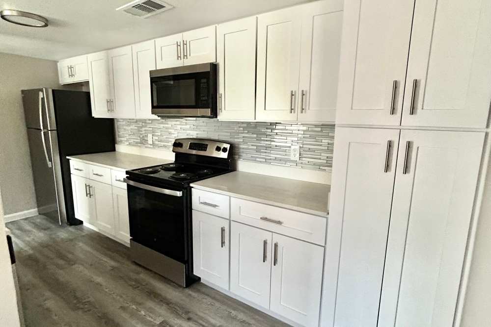 Well equipped kitchen at Athena Garden Apartments in Athens, Texas