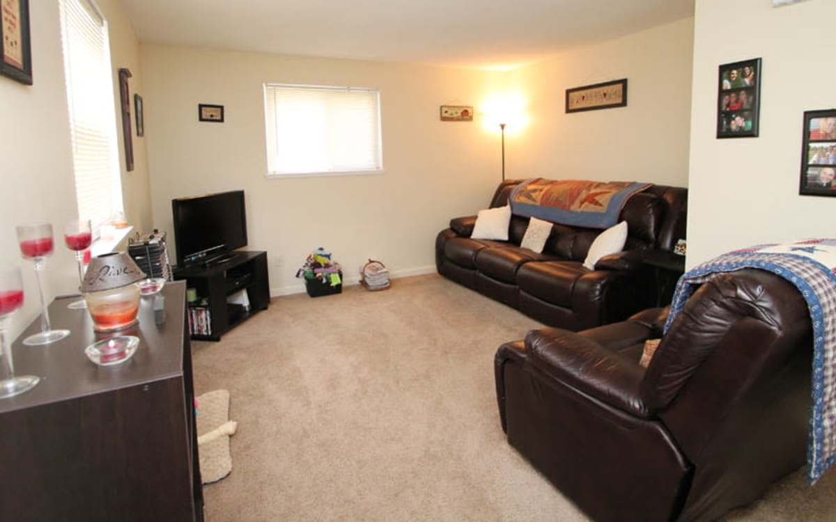 Living room at Fleming Creek & Brookside Townhomes in Rochester, New York