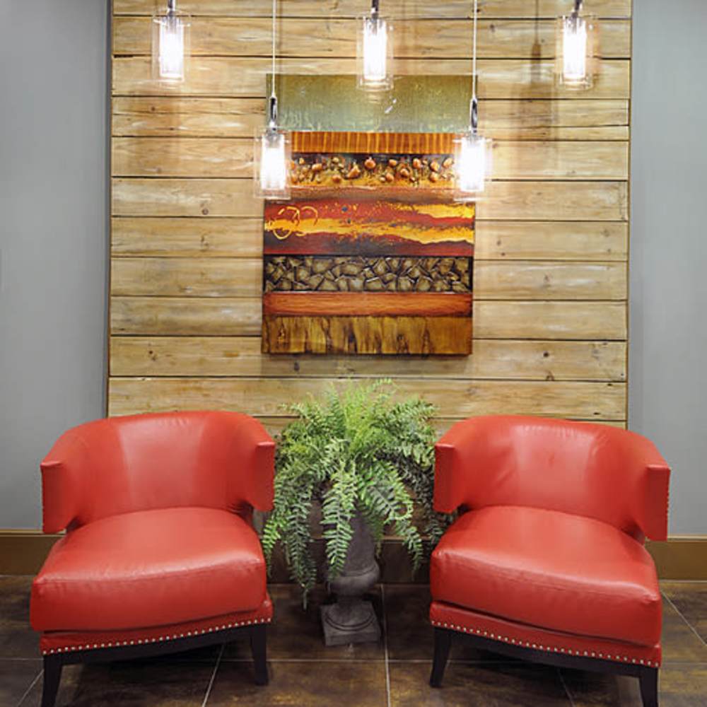 Cozy and well-lit seating area at Avonlea Towne Lake in Woodstock, Georgia