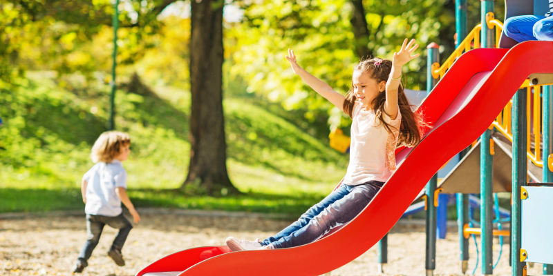 Children playing at a park near Sea Breeze Village in Seal Beach, California