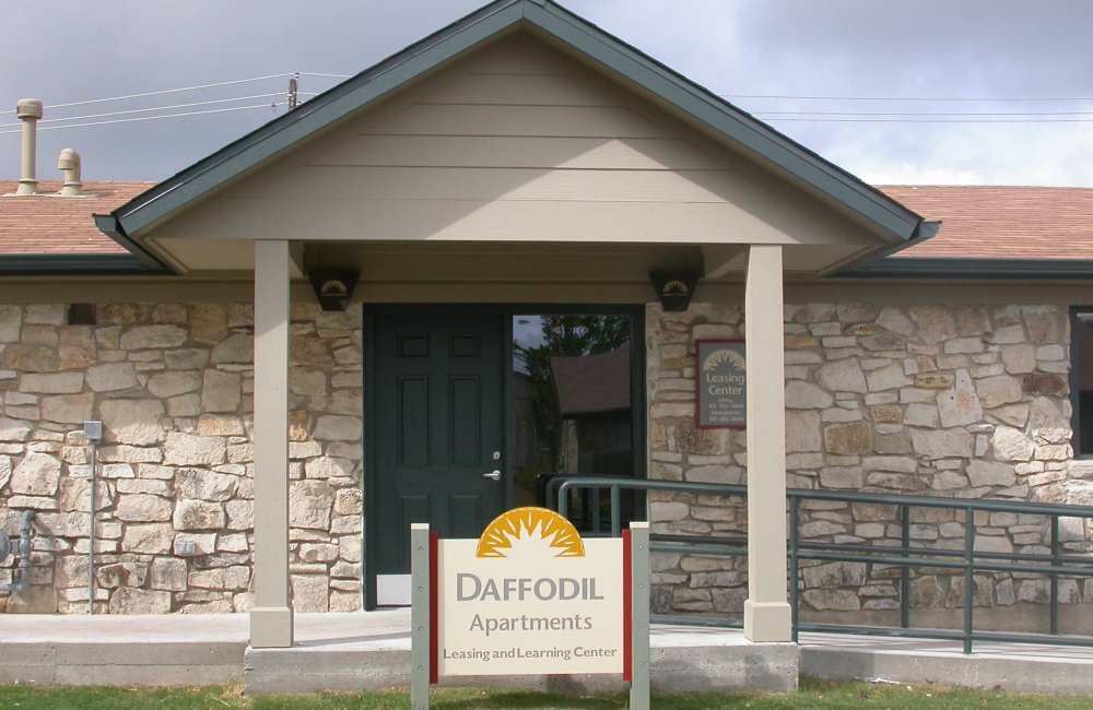 Building exterior with a signboard at Daffodil in Austin, Texas 