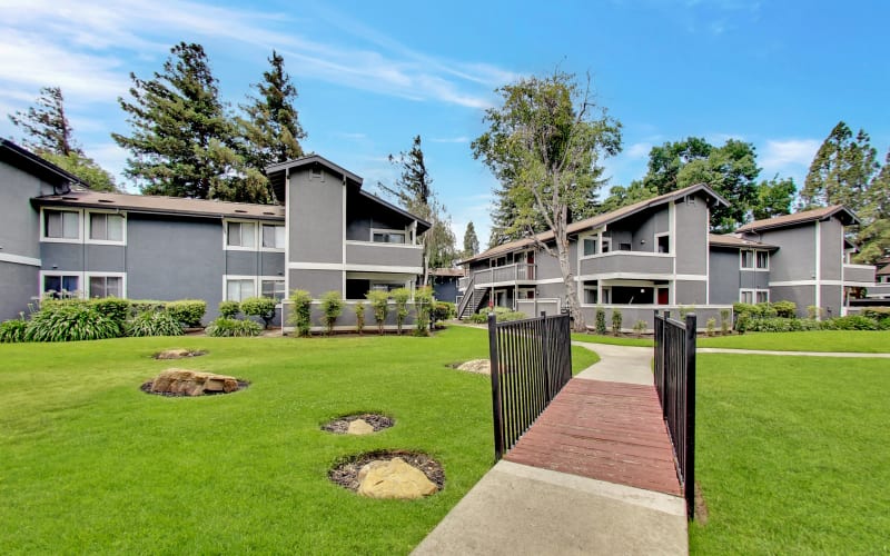 Exterior of the building and beautiful landscaping at Avery Park Apartments in Fairfield, California
