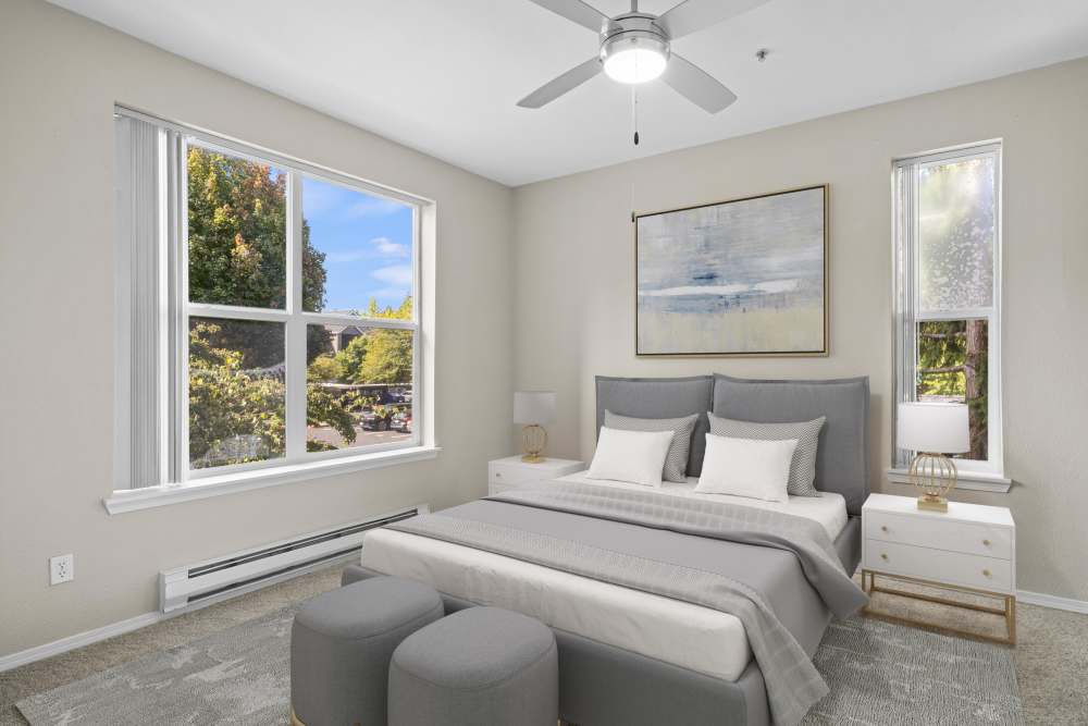 A comfortable bedroom at Wildreed Apartments in Everett, Washington