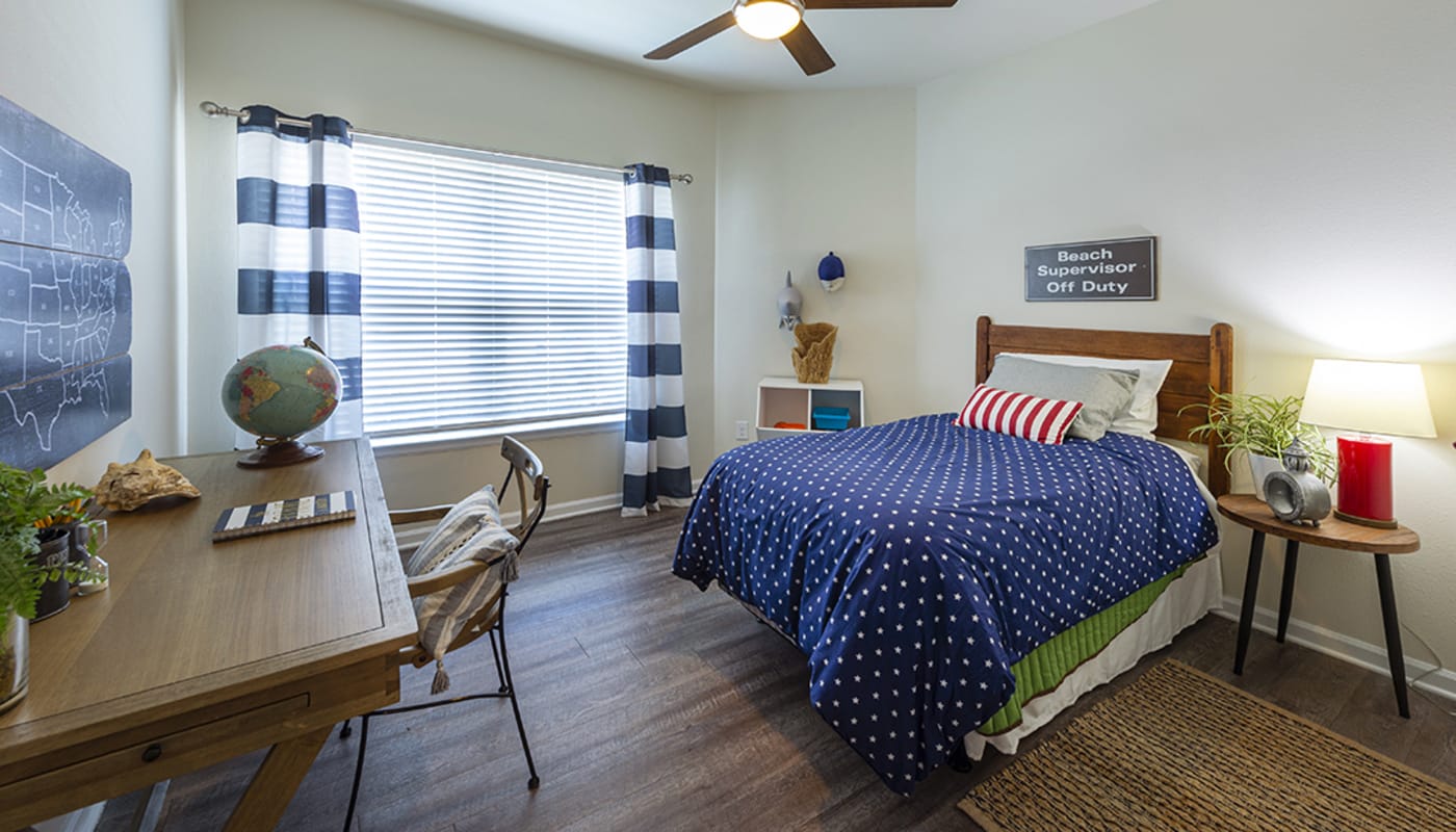 model apartment bedroom at Brazos Crossing in Richwood, Texas