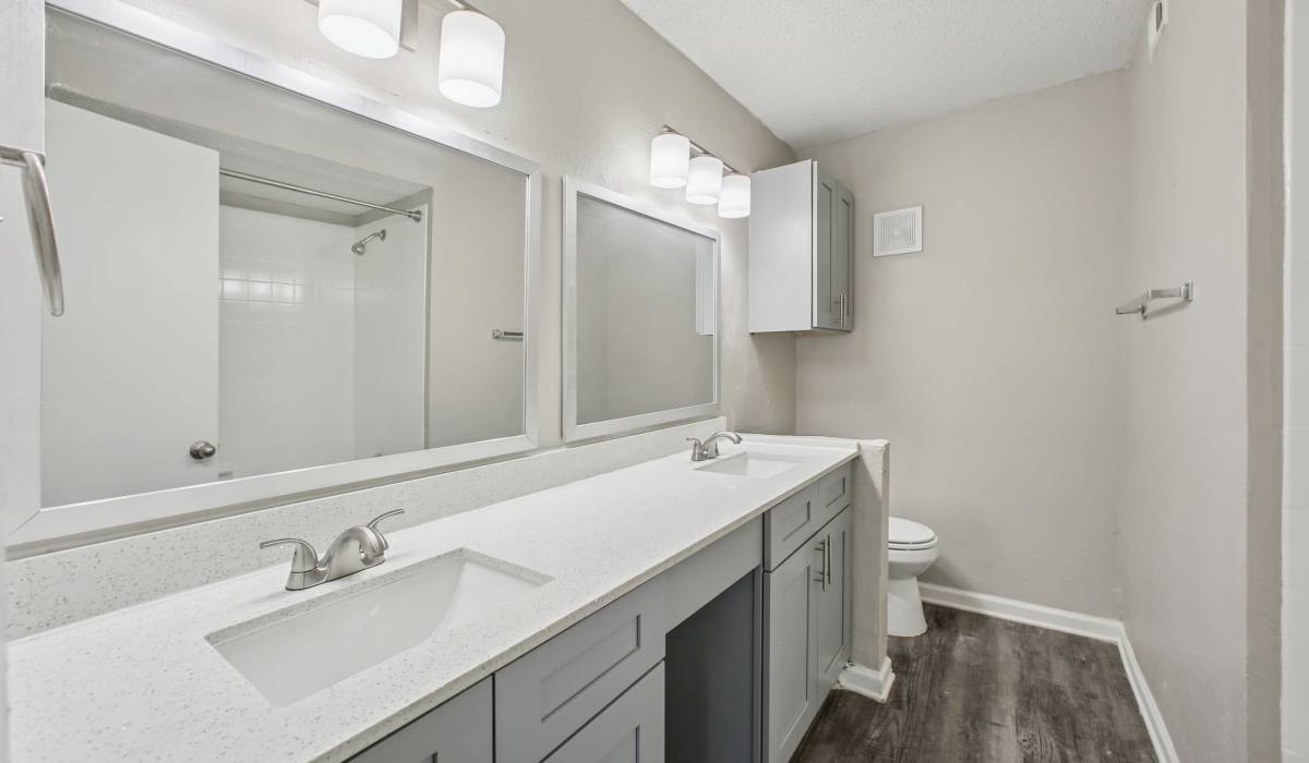 Bathroom with nice countertop at Fiona Apartment Homes in Irving, Texas