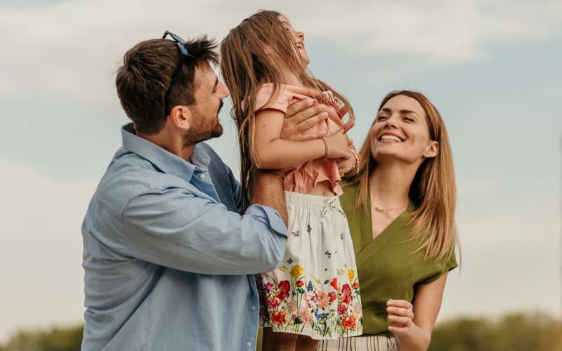Happy family having fun at park near Hart Townes in Woodruff, South Carolina