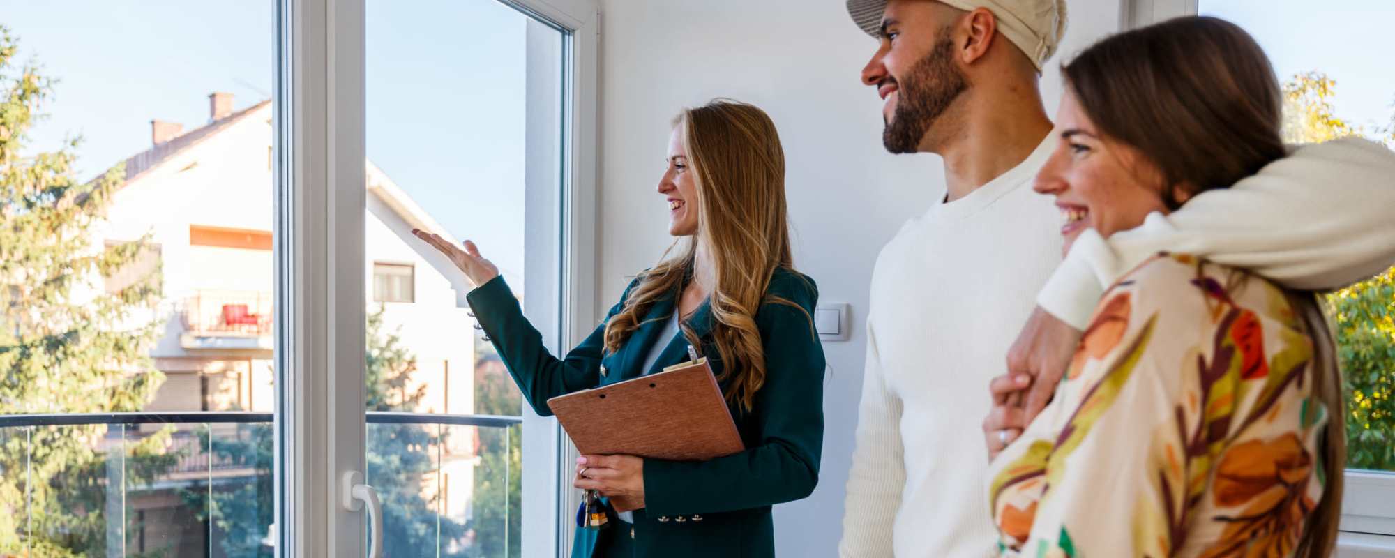 Member of the team showing a client new apartment at ARTISAN Management Group in Des Moines, Iowa